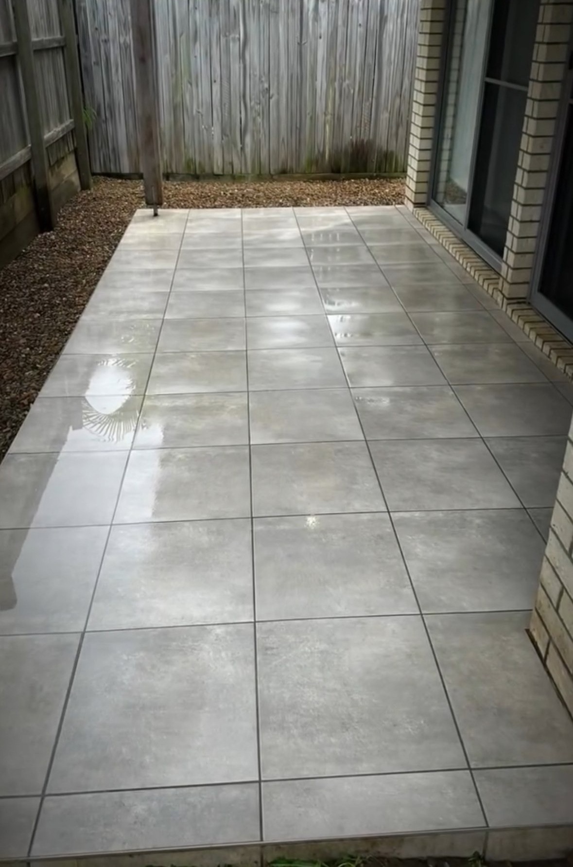 Clean tiled patio after washing